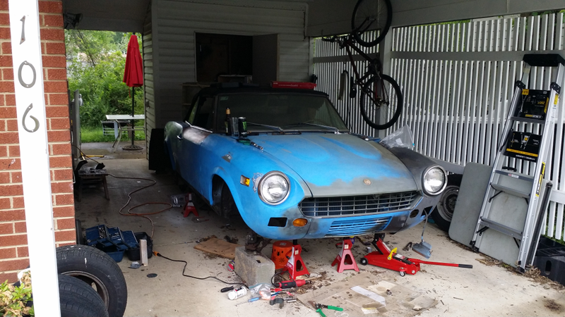 Illustration for article titled Follow along as I live blog the removal of my driver's side front spring and A-arms on my '77 Fiat Spider